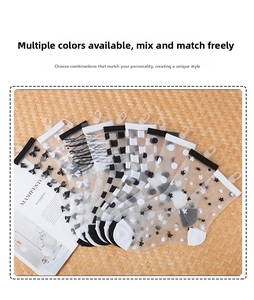 Flat lay of seven pairs of sheer mesh socks with patterns like polka dots and stars