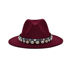 Classic burgundy wide brim fedora hat featuring woven band with white seashell decorations
