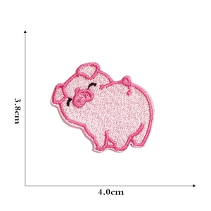 Detailed view of pink pig embroidery patch with dimensions 3.8cm height and 4.0cm width