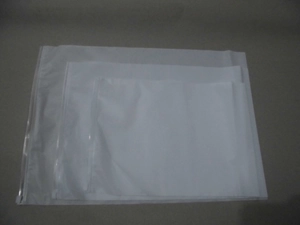 Close-up of frosted translucent waterproof travel storage bags with zipper closures