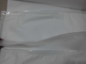 Close-up of frosted translucent waterproof travel storage bags with slider zippers