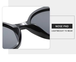 Detail showing the lightweight integrated nose pad design on glossy black sunglasses