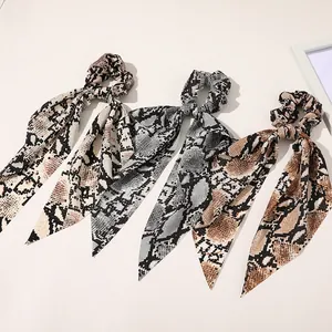 Three-piece set of elegant snakeskin print satin hair scrunchies with long ribbons