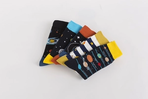 Close-up of colorful cotton socks featuring solar system planet names and motifs