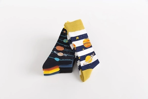 Close-up of cotton socks with space patterns featuring planets like Mars and Jupiter