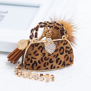 Leopard print faux fur handbag keychain with gold heart crystal clasp and tassel charm