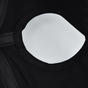 Macro detail of breathable black mesh fabric and eye design on Spider-Man baseball cap