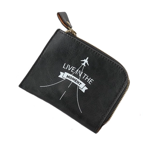 Black PU leather coin purse with zipper and airplane motif printed with Live in the moment