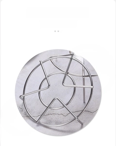 Macro shot of 304 stainless steel steaming rack with pentagram support structure