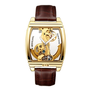 Macro view of skeleton mechanical watch movement with bronze case and brown leather strap