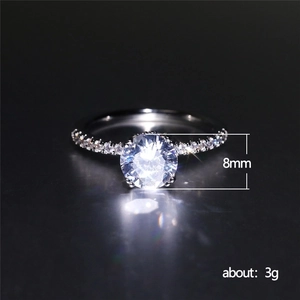 Classic white gold plated ring with 8mm round zircon in four-prong setting