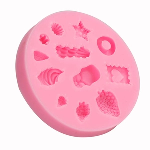 Pink silicone mold with shell and strawberry shapes for DIY dessert and crafts