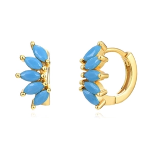 Detailed close-up of gold hoop earrings with marquise-cut turquoise fan-shaped design
