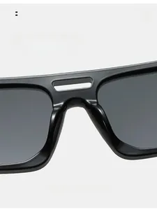 Detail shot of comfortable integrated nose pads on black irregular sunglasses