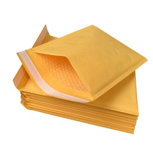 Padded yellow kraft paper bubble mailers with self-sealing strip for shipping protection