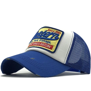 Retro blue and white trucker hat with vintage Western embroidery and distressed brim