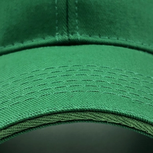 Solid green mesh baseball cap with detailed stitching on the brim for casual outdoor wear