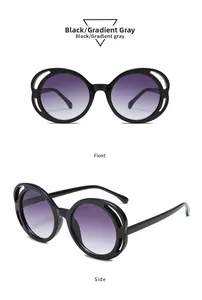 Detail of round sunglasses with hollowed-out frame and purple gradient lenses