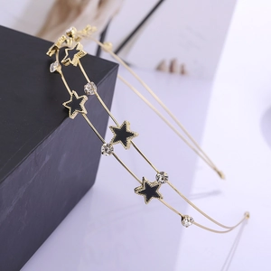 Double-layered gold star headband with black enamel stars and sparkling rhinestones