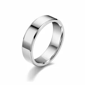 Macro view of polished titanium steel ring with 6mm width and beveled edges