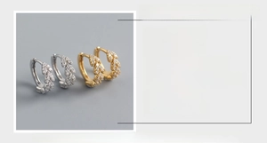 Detail showing S925 sterling silver leaf earrings with inlaid diamonds and dimensions