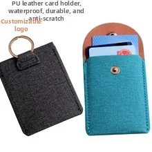 Waterproof PU leather card holder detailing with metal ring and snap button closure