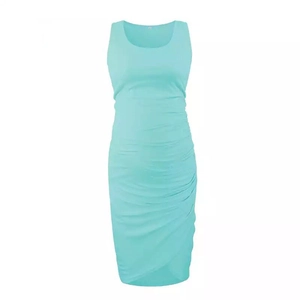 Detail of side ruching on a sleeveless mint green maternity dress with round neck
