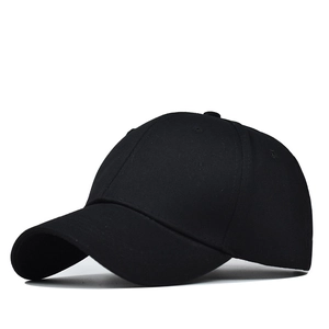 Detail view of cotton ponytail baseball cap with classic six-panel structure and curved brim