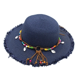 Ethnic navy straw hat with shell charms and colorful bead tassel decoration