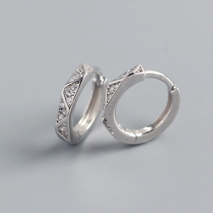 Close-up of S925 sterling silver hoop earrings with triangular geometric diamonds