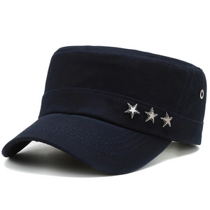 Detail of navy flat top military cap with three silver star metal badges on the side