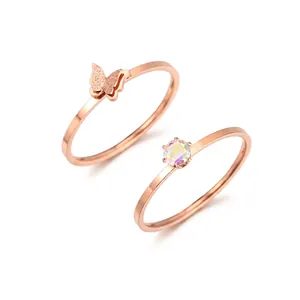 Chic rose gold titanium steel ring set with a butterfly design and iridescent gemstone