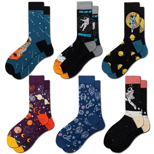 Detail view of 6-pack mid-calf socks with space astronaut and galaxy knitting designs