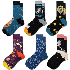 Set of six crew socks featuring outer space designs with astronauts and planets on white backdrop