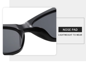 Détail des plaquettes de nez intégrées sur lunettes de soleil œil de chat noires