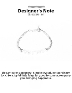 Detailed view of beaded bracelet featuring white crystal beads and silver lobster clasp
