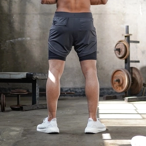 Men's 2-in-1 quick-dry gym shorts in charcoal grey with back zipper pocket detail