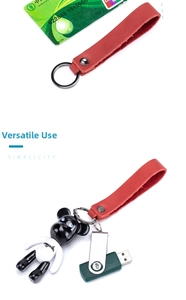 Red leather car keychain strap with metal ring and functional USB drive accessory