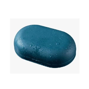 Waterproof dark teal travel soap box with leakproof lid and water droplets on matte surface