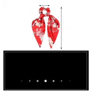 Detail view of red floral satin scrunchie with ribbons showing size measurements