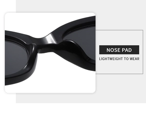 Detailed close-up of the lightweight integrated nose pad on black cat eye sunglasses