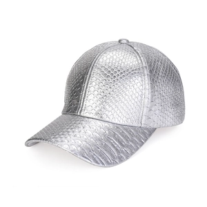 Detail of silver PU leather baseball cap with crocodile skin texture and metallic finish