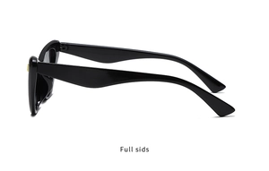 Vue latérale des lunettes de soleil cat eye vintage avec branches larges et accents dorés