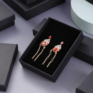 Chinese style opera earrings with red gemstones and gold tassels in black gift box