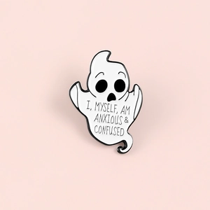 Detail of enamel ghost brooch featuring I, MYSELF, AM ANXIOUS & CONFUSED text engraving