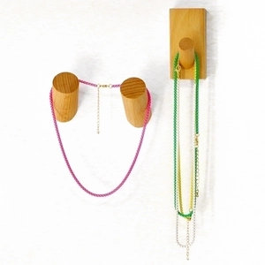 Detail of colorful bohemian metal link chains with lobster clasp and adjustable tail