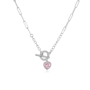 Detail of 18K gold plated heart pendant with pink stone and zircon encrusted OT clasp