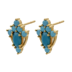 Detailed close-up of bohemian gold earrings featuring turquoise stones and cluster studs