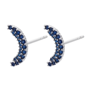 Detailed view of crescent moon stud earrings with blue pave zircon in silver setting