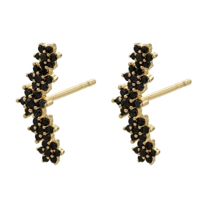 Detail of flower shaped earrings with black crystals and 18K gold plated finish